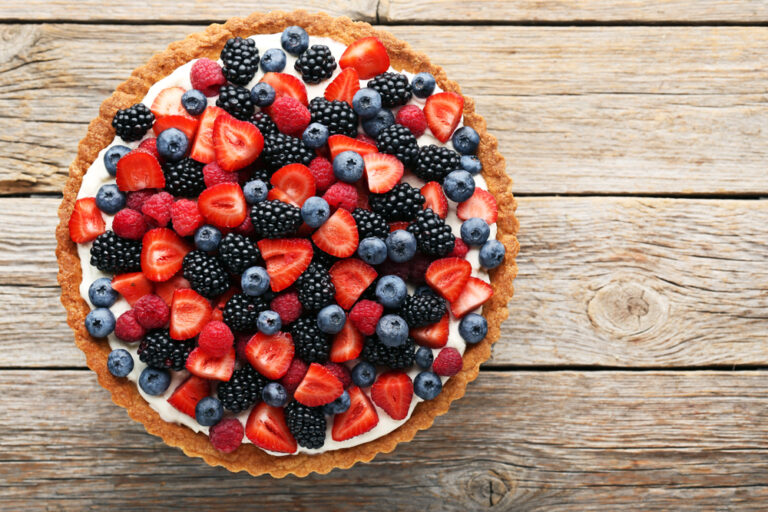 Sweet,Tart,With,Berries,On,Grey,Wooden,Table