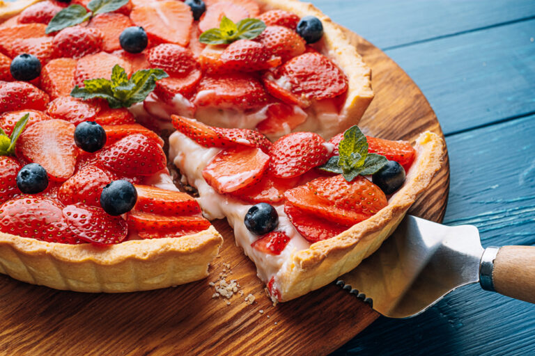 Quiche,With,Lime,Zest,And,Strawberry,Slices,With,Blueberries,And
