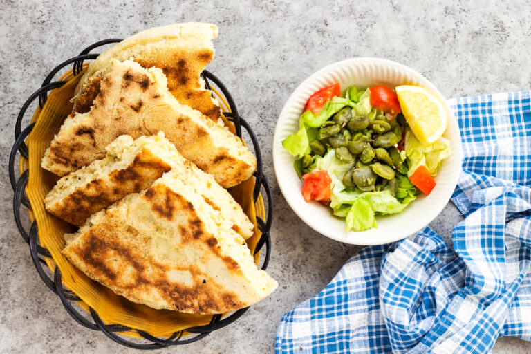 Algerian,Homemade,Bread,Named,Matlouh,In,Arabic,And,Salad,Bowl
